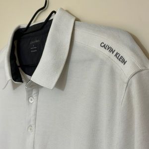 Calvin Klein white polo shirt. Size XL.